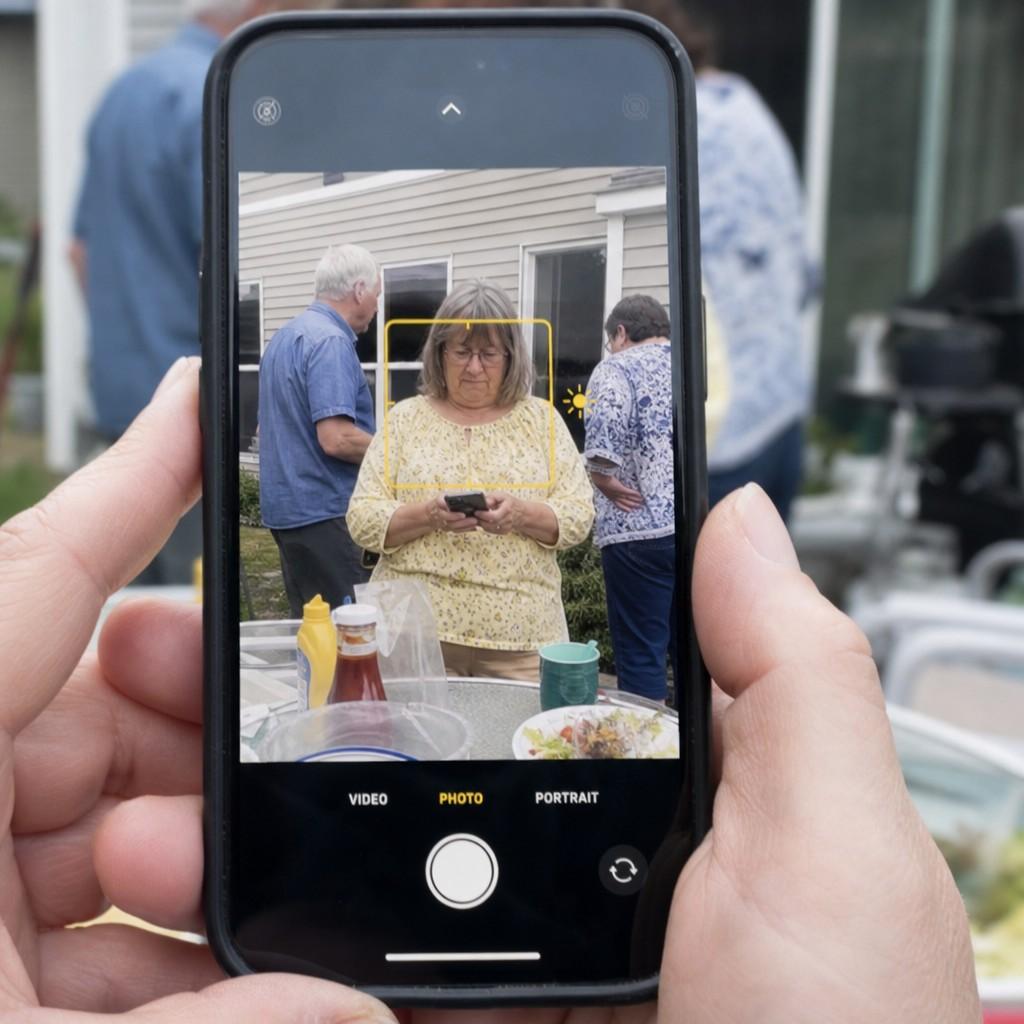 A phone screen with a focus square tapped on the subject