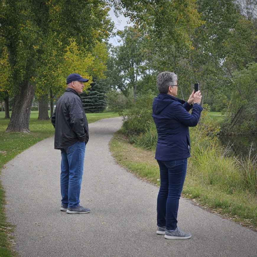 One walker pausing to photograph something off the path